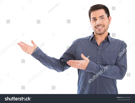 Isolated Smiling Man Presenting His Hands Stock Photo 434125528