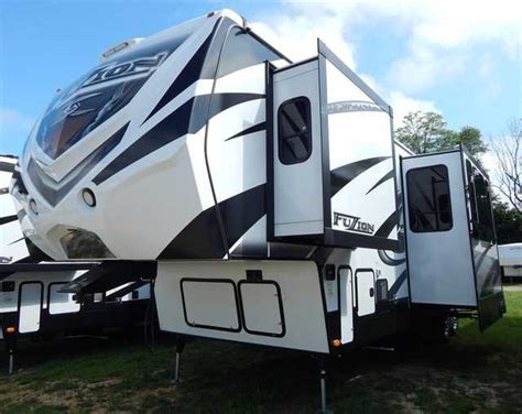 2015 New Keystone Fuzion 342 Triple Slide Toy Hauler W 11 Toy Hauler