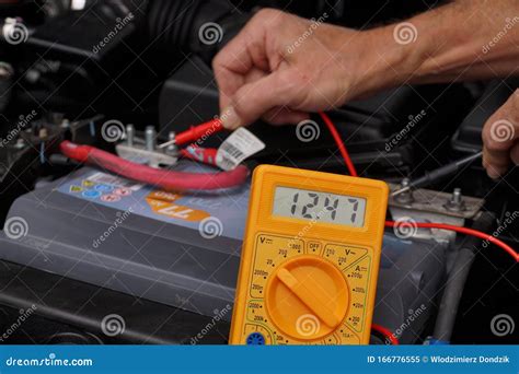 Voltage Measurement Using A Multimeter In An Electrical Panel Stock Image