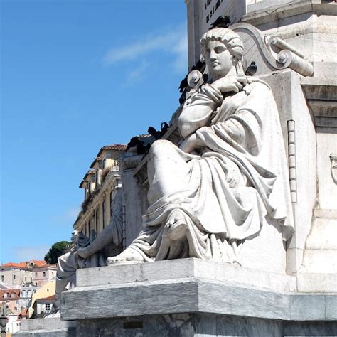 Premium Photo Low Angle View Of Statue Situated On The Base Of Pedro