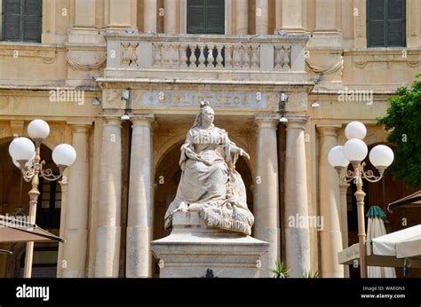 A Statue Of Queen Victoria Outside The Library In Valletta Malta Stock