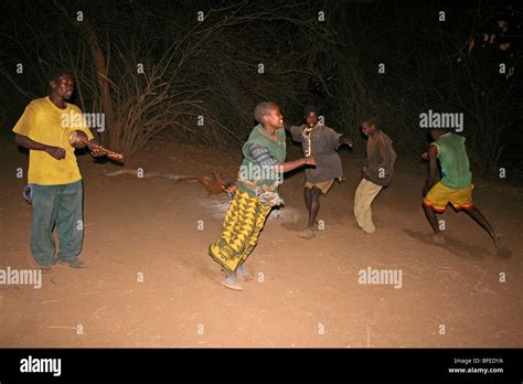 Hadza Tribe People Performing Traditional Dance Accompanied By A Zeze ...