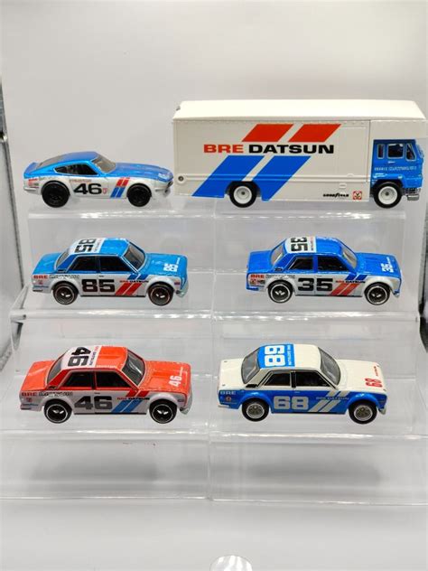 Hot Wheels Datsun Bluebird Bre Lot Of Inclusive Transporter