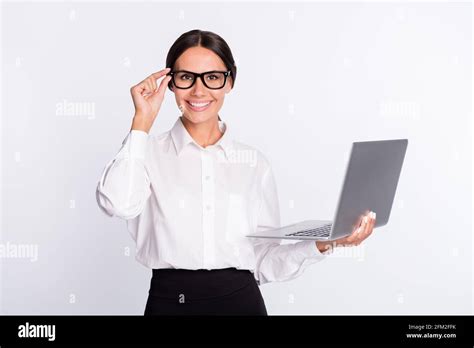 Photo Of Optimistic Brunette Hairdo Lady Hold Laptop Wear Spectacles