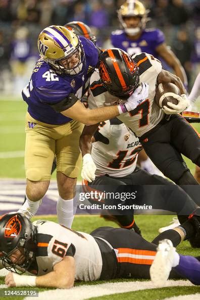 Washington Carson Bruener tackles Oregon State Silas Bolden during a... News Photo - Getty Images