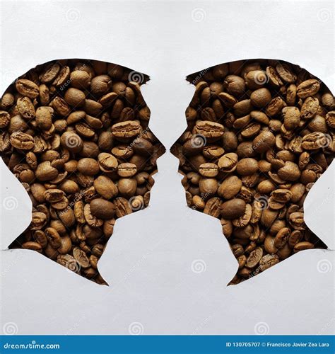 Figure Of Two Masculine Human Faces Of Profile With Roasted Coffee