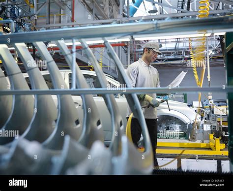 Worker Assembly Line Car High Resolution Stock Photography And Images