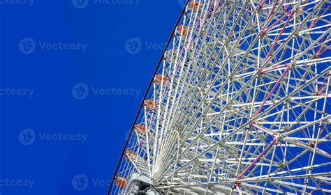 Closeup And Crop Tempozan Giant Ferris Wheel On Bright Blue Sky