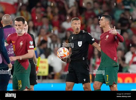 Portugal S Cristiano Ronaldo Right Talks To Referee Davide Massa