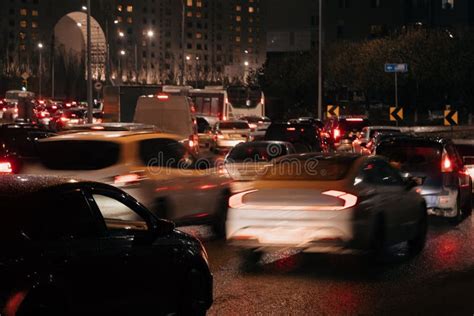 Evening Car Traffic In A Big City Cars In Motion And Standing In