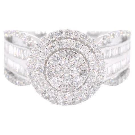 White Gold Entourage Ring With Brilliant And Baguette Cut Diamonds For