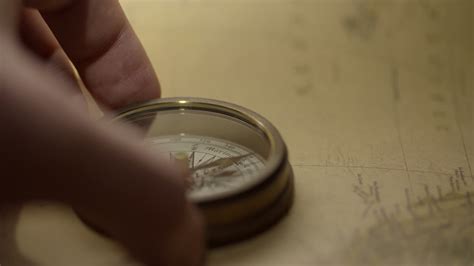 Free Stock Video Finding North On Vintage Compass