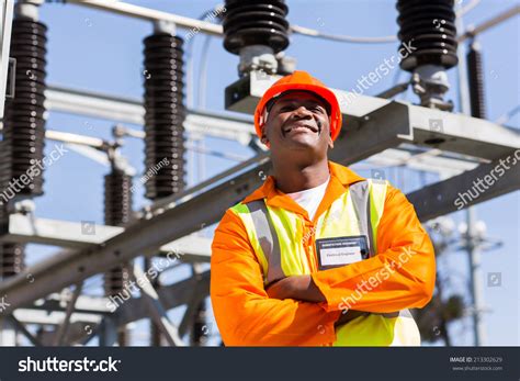 African Electrical Engineer Arms Crossed Electricity Stock Photo