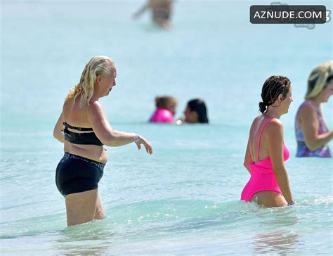 Lydia Bright Sexy Shows Off Her Beautiful Figure Wearing A Hot Pink Swimsuit At The Beach With