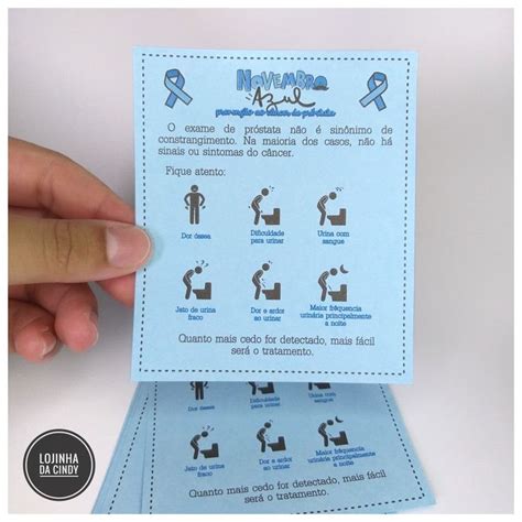 A Person Holding Up A Blue Card With Instructions On How To Use The