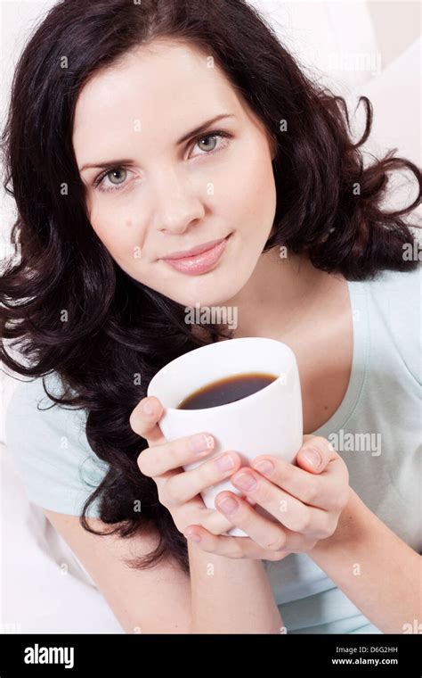 Smiling Brunette Woman Drinking Black Coffee In The Morning Stock Photo Alamy