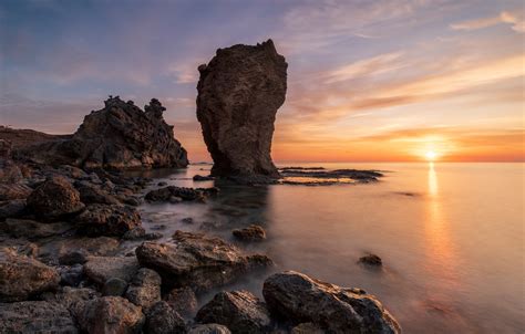 Wallpaper Sea Clouds Sunset Stones Rocks Dawn Shore For Mobile