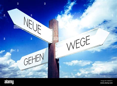 Neue Wege Gehen German Go New Ways English Signpost With Three