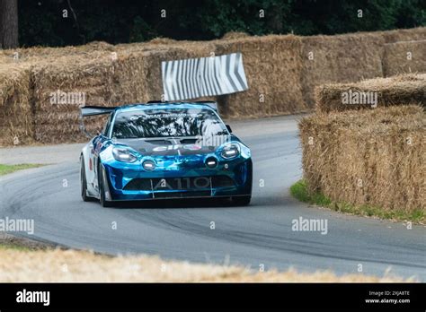 Alpine A Pikes Peak Car Driving Up The Hill Climb Track At The