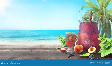 Refreshing Fruit Juice On The Tropical Beach Summer Background Royalty