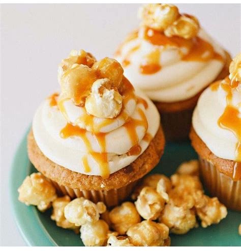 Three Cupcakes With Caramel Drizzled On Them