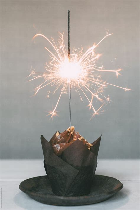 Chocolate Cupcake With Sparkler By Stocksy Contributor Amy Covington Stocksy