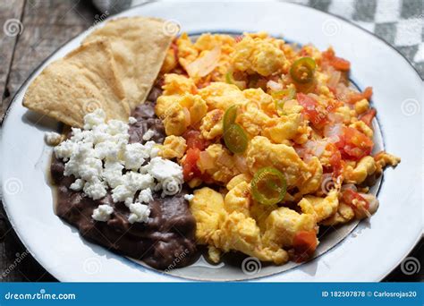 Mexican Style Scrambled Eggs with Fried Beans, Cheese and Jalapeno ...