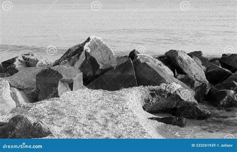 Black And White Photo With Beautiful Wet Stones On Black And White