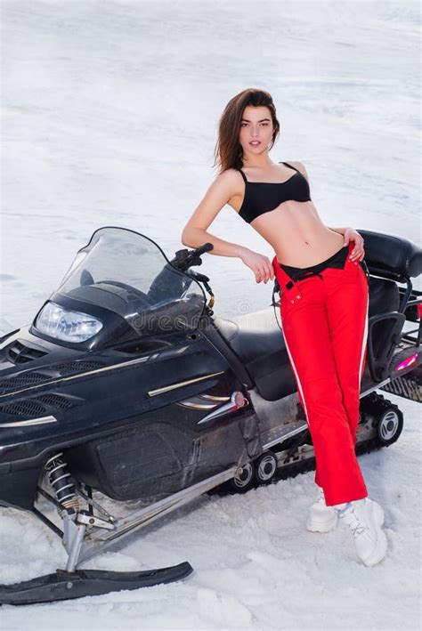 Woman Posing With Snowmobile In Snowy Winter Snow Mobile Girl Driving