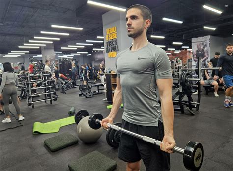 Wide Grip Barbell Curl Guide How To Benefits Mistakes Alternatives