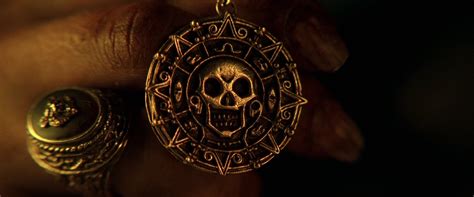 Elizabeth Swann S Gold Medallion Pirates Of The Caribbean Wiki The Unofficial Pirates Of The