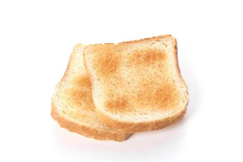 Premium Photo Close Up Of Bread In Plate Against White Background