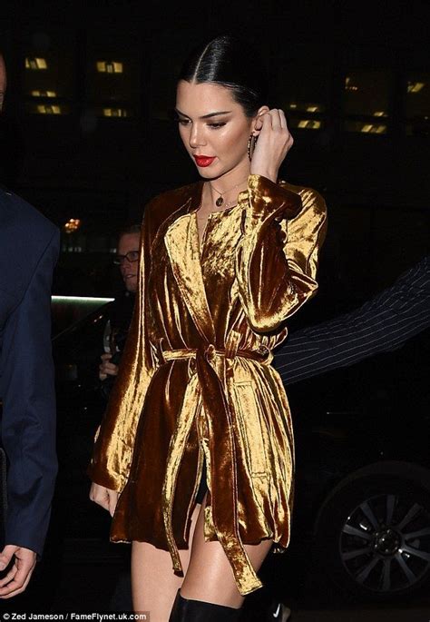 Kendall Jenner Dazzles In Metallic Velvet Mini Dress During LFW