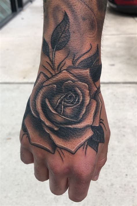 Tattoo uploaded by Benjamin Barreto • Black and grey rose | Hand ...