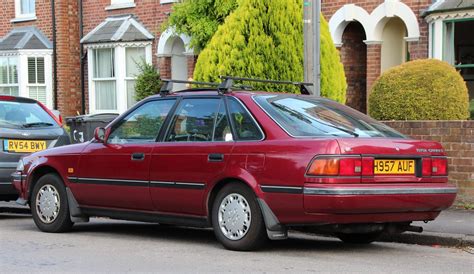 H957 AUF 1 1991 Toyota Carina II GL Liftback Supplied B Flickr