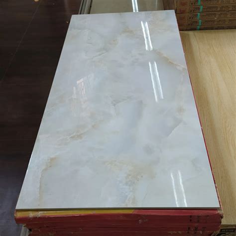 Jual Granit Garuda 120x60 Motif Dragon Cream Tekstur Glossy Kab