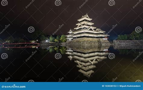 Reflection Of Matsumoto Castle With A Swan In Matsumoto Nagano Japan