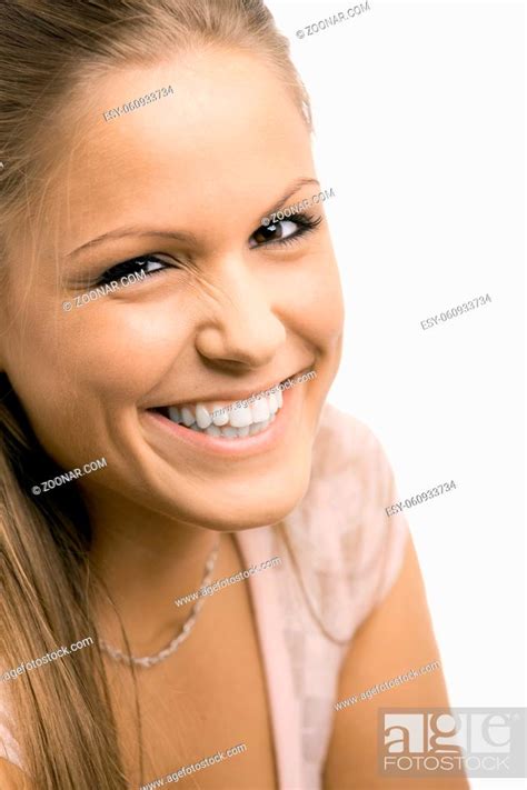 Portrait Of Beautiful Smiling College Girl Looking At Camera Isolated On White Background