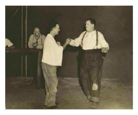 Rare Picture Oflaurel And Hardy Rehearsing For The Famous Dance Number From Way Out West Laurel