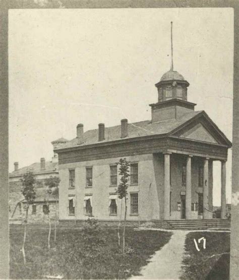 An Old Black And White Photo Of A Building