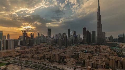 Sunset Over Dubai Downtown With Tallest Skyscraper And Other Towers