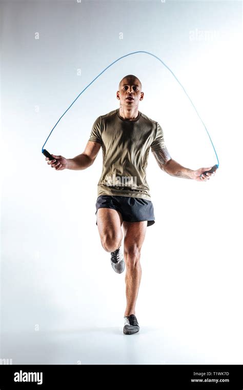 Man Jumping With Skipping Rope During The Training Stock Photo Alamy