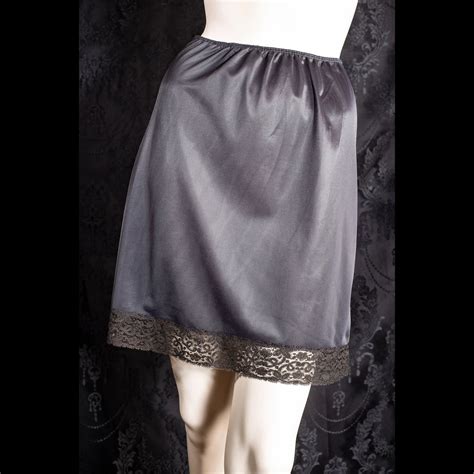 Desirable Early 1960s Vintage Sexy Shimmering Silky Soft Black Nylon And Lace Mini Half Slip