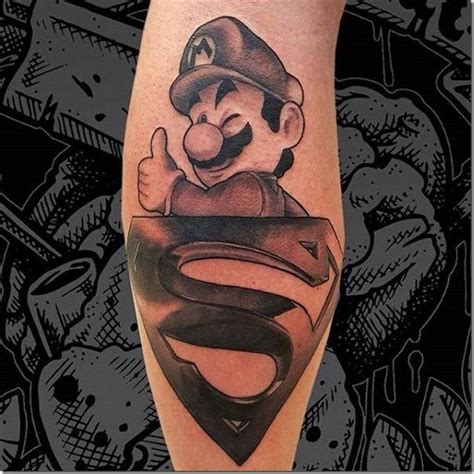 A Tattoo On The Leg Of A Man With A Superman Symbol In His Chest And Arms