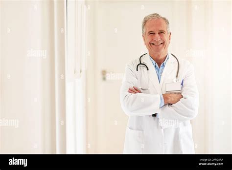 Portrait Smiling Mature Doctor Hi Res Stock Photography And Images Alamy