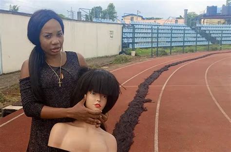 Nigerian Lady Breaks Guinness World Record For The Longest Handmade Wig