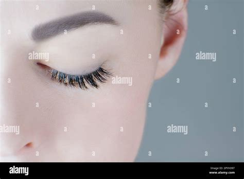 Close Up Of Closed Eye With Magnificent Long Eyelashes Flawless Skin