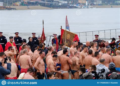 Orthodox Christians Swimming For The Holy Cross In The Icy Cold Water