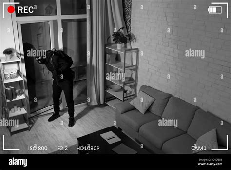 Thief With Crowbar Entering Into House View From Camera Stock Photo Alamy