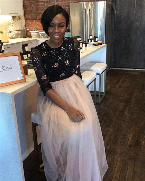 Nneji Akunne At An ILERA Apothecary Event Wearing The Perfect Custom